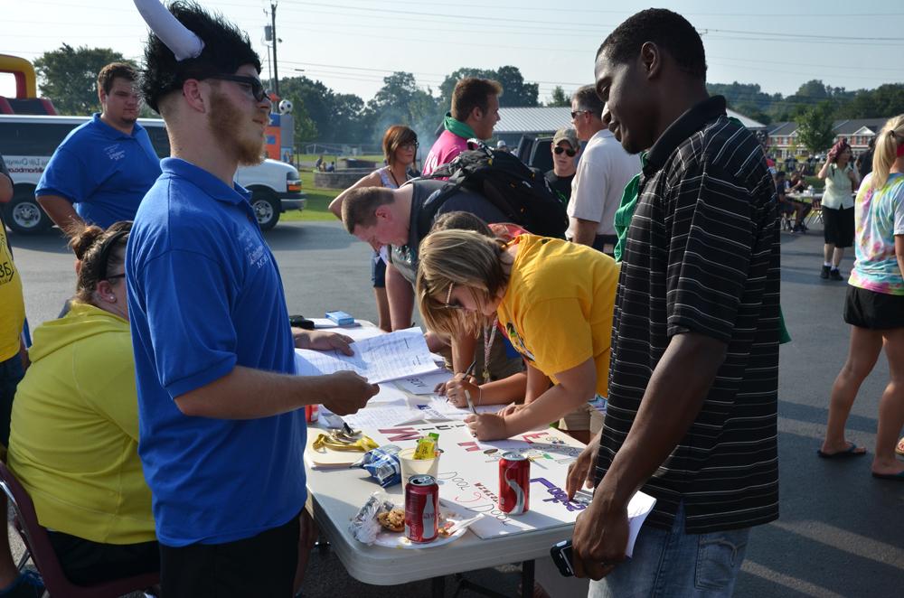 Josh Vincent (right) talks to Yues Jeanbaptiste (left) about joining Baptist Campus Ministry. (Campbellsville University photo by Drew Tucker)